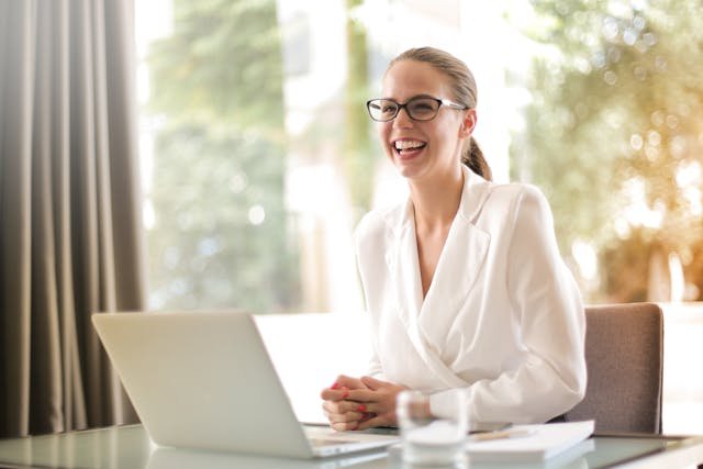 Introverts in Leadership - Woman in white blouse at desk